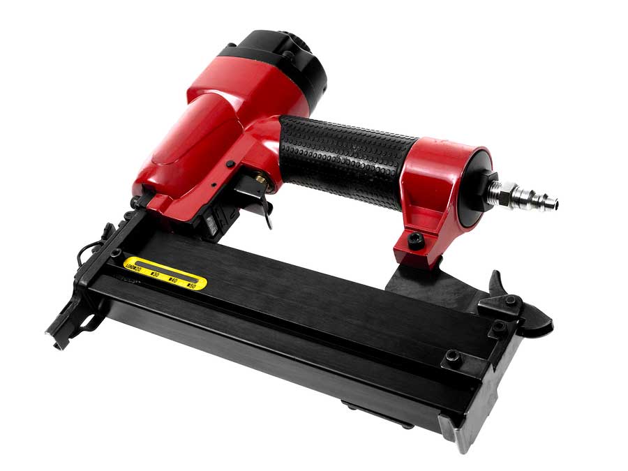 red pneumatic nail gun